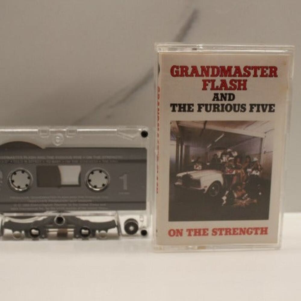 Grandmaster Flash and The Furious Five - On The Strength NEAR MINT Cassette 1988